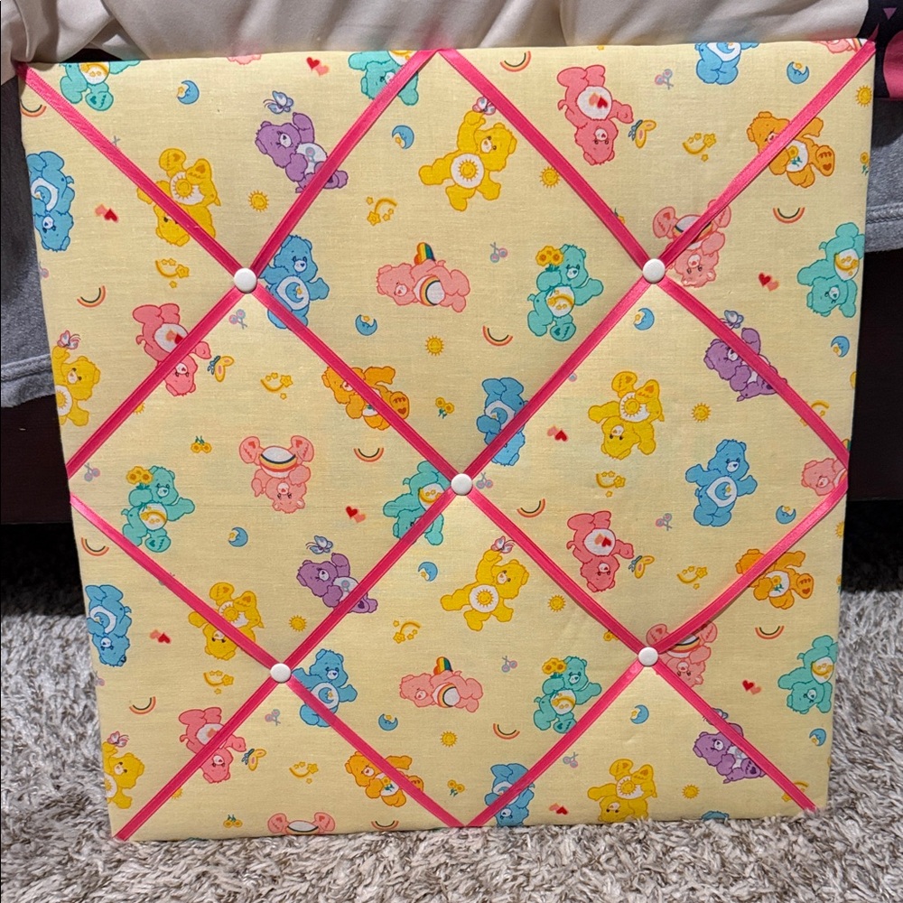 Care Bears themed fabric memory board